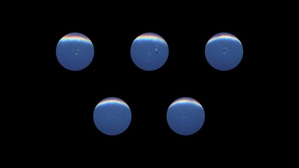a set of blue clear circles, empty stationery tacks, front view, isolated metal push rounded pins on black background