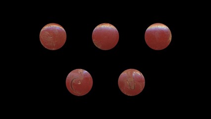 a set of red aged circles, rusty stationery tacks, front view, isolated metal push rounded pins on black background