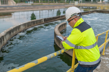 Environmental engineers work at wastewater treatment plants,Water supply engineering working at Water recycling plant for reuse