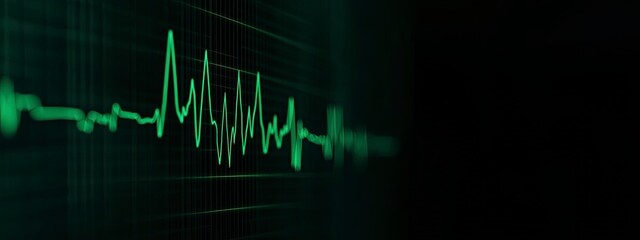 Close-up of an EKG monitor, green line showing heart rate, soft medical lighting in the background