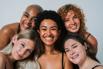 Obraz premium Beautiful diverse women wearing lingerie posing for body positive concepts - Multiethnic group of female adults celbrating body acceptance, diversity, self-esteem