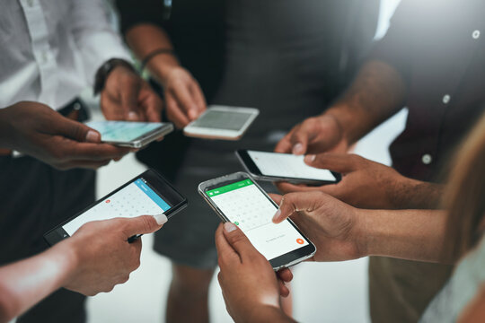 Hands, business people and group with phone in circle for networking, social or communication. Closeup, team or mobile screen to share calendar app, connection or update schedule for event planning