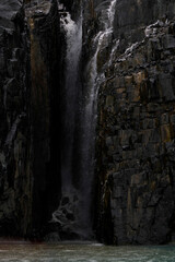 The Alkefjellet cliff in Lomfjordhalvoya in Ny-Friesland at Spitsbergen