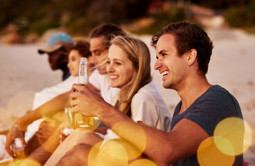 Beach, friends and bonding together for picnic or social as group on holiday, vacation or break. People, relax and happy with beer for summer season, wellness and outdoor adventure by ocean in Greece