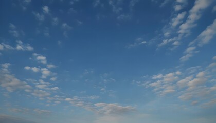 Obraz premium Clear Morning Sky with Scattered Clouds