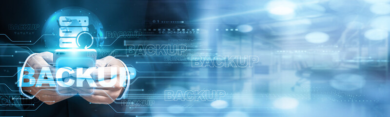 Backup. IT technician using mobile smartphone and Backup icon network connection to secure data with growth in data management, remote access, cloud storage, and cybersecurity measures.