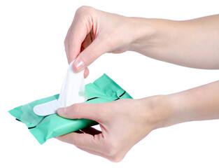 Fototapeta premium a pack of wet wipes in female hand on white background isolation