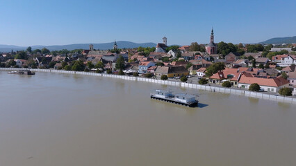 
European flood aerial view: Szentendre (Hungary) mobile flood protection walls defend.