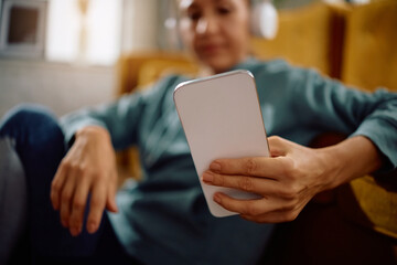 Close up of woman using smart phone.