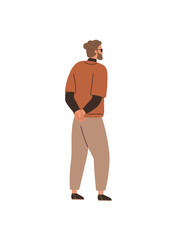 Fototapeta premium Man standing with hands clasped behind his back in a relaxed posture. Wearing casual autumn attire, indicating a pensive mood. Ideal for themes contemplation, casual fashion, relaxation, autumn