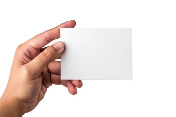 Obraz premium A person holds a white business card in their hand, ready for networking or professional interactions