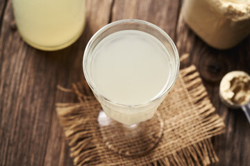 Fresh natural whey in a glass cup