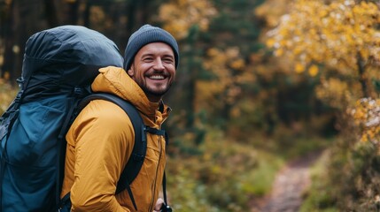Fototapeta premium A happy traveler hikes through vibrant autumn leaves enjoying natures peace