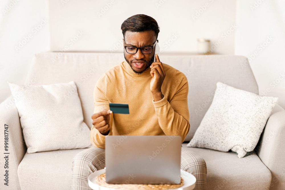 Poster discontented black man calling to bank solving problems with credit card shopping online on laptop a