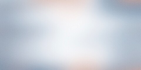 Blurred smooth gradient transitioning from blue to light beige with noise effect