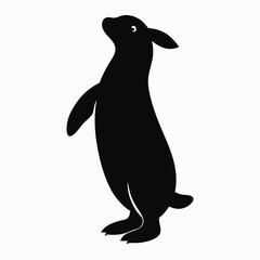 Naklejka premium a penguin standing on its hind legs. The penguin is facing towards the right side of the image and its head is tilted slightly upwards, vector silhouette 