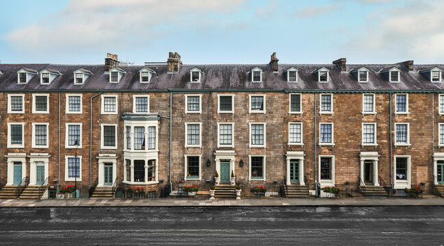 Aerial panoramic view of a row of exclusive five storey Victorian townhouses in the UK