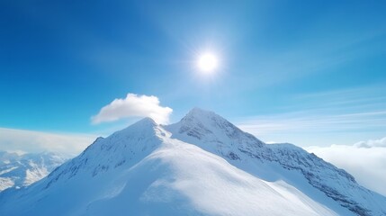 Snow-Covered Mountains Under Bright Sunlight