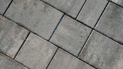 The texture of the street tiles