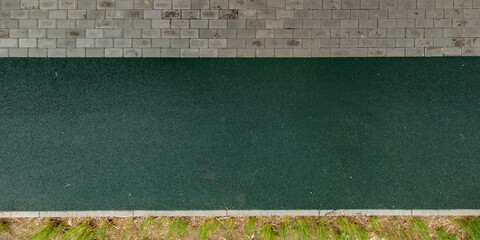 Fototapeta premium top view of the texture of paving slabs on pedestrian path