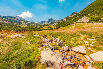 Mountain landscape in National Park Retezat, Romania. Hiking to Lacul Bucura througth Cabana Gențiana. Taul Pietrele
