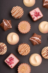 photo, assortment, assorted, chocolate, background, product, enjoyment, pattern, sweet, various, shape, size, design, decorated, premium, craft, dark, cacao