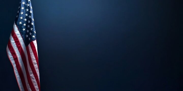 American flag displayed against a dark blue background with ample copy space for design purposes
