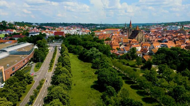 4K Aerial Drone Video of Rezatparkplatz West Parking Lot on the Frankische Rezat River in Ansbach, Germany