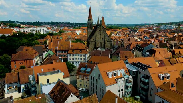4K Aerial Drone Video of the St. Johannis Kirche Church in Downtown Ansbach, Germany