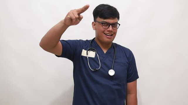 Asian doctor man waving over isolated white background with a friendly and happy expression