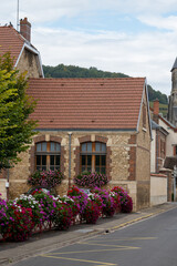 Harvest time on green grand cru vineyards near Oger and Mesnil-sur-Oger, region Champagne, France. Villages of Cote des Blancs