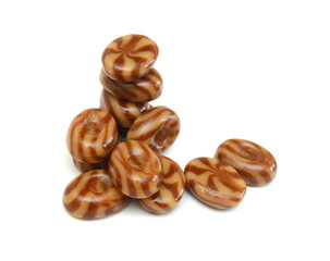 Caramel candies isolated on white background