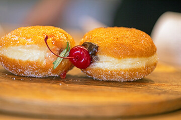 appetizing vegan donuts with cherries. good morning