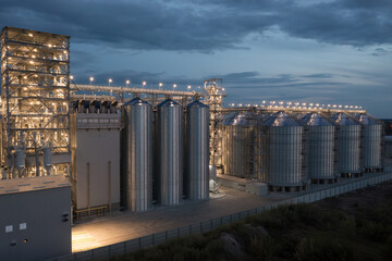 Aerial View of Industrial Grain Storage Facility at Dusk