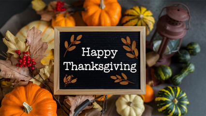 Happy thanksgiving day text minimal background with dry fall leaves