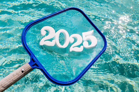 Celebratory 2025 numerals floating in a sunlit swimming pool
