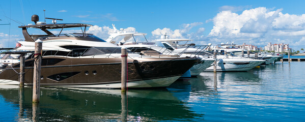 Luxury boat. Marina in Miami Beach, Florida USA. Yacht boat docked on sea Biscayne bay. Downtown...