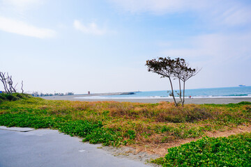 Kaohsiung, Taiwan, Republic of China, 01 25 2024: The landscape of Kaosiung Sizihwan Bay beach in Kaohsiung  © Feng