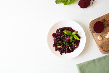 Beet salad with pecans. Beet salad top view