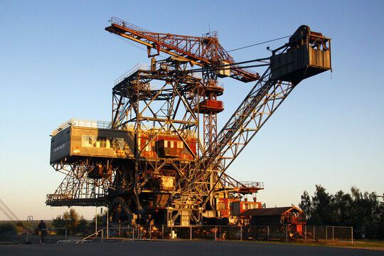Graefenheinichen, Germany - September 21, 2024: Ferropolis (City of Iron), an open-air museum of huge industrial machines and a venue for music festivals on the site of a former strip mining operation