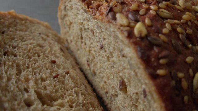 Sliced pieces of multigrain bread topped with various seeds, emphasizing the rich texture and wholesome ingredients.