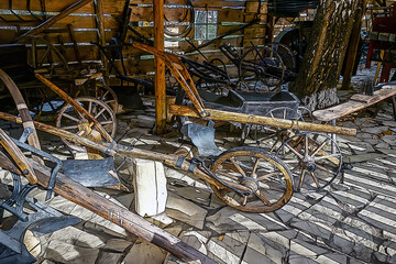 Ancient agricultural equipment in a shed