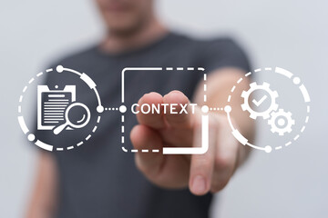 Man using virtual touch screen presses word: CONTEXT. Context business education concept. Context...