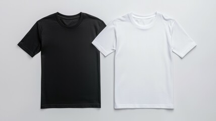Naklejka premium Two t-shirts, one black and one white, are displayed on a white background