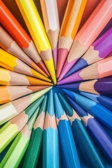 Fototapeta premium Colorful pencils arranged in a circle, creative and artistic concept for school, education, or office
