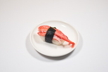 「蟹のお寿司（crab sushi）」は、見た目も鮮やかです。