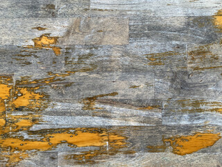 old painted wall,wood gain with old yellow paint texture.