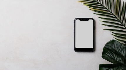 Modern Smartphone with Blank Screen on Minimalist Background with Green Leaves