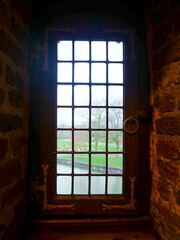 Antique Window Overlooking Serene Garden