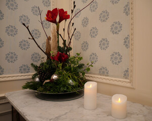 Elegant Floral Arrangement with Candles on Marble Table